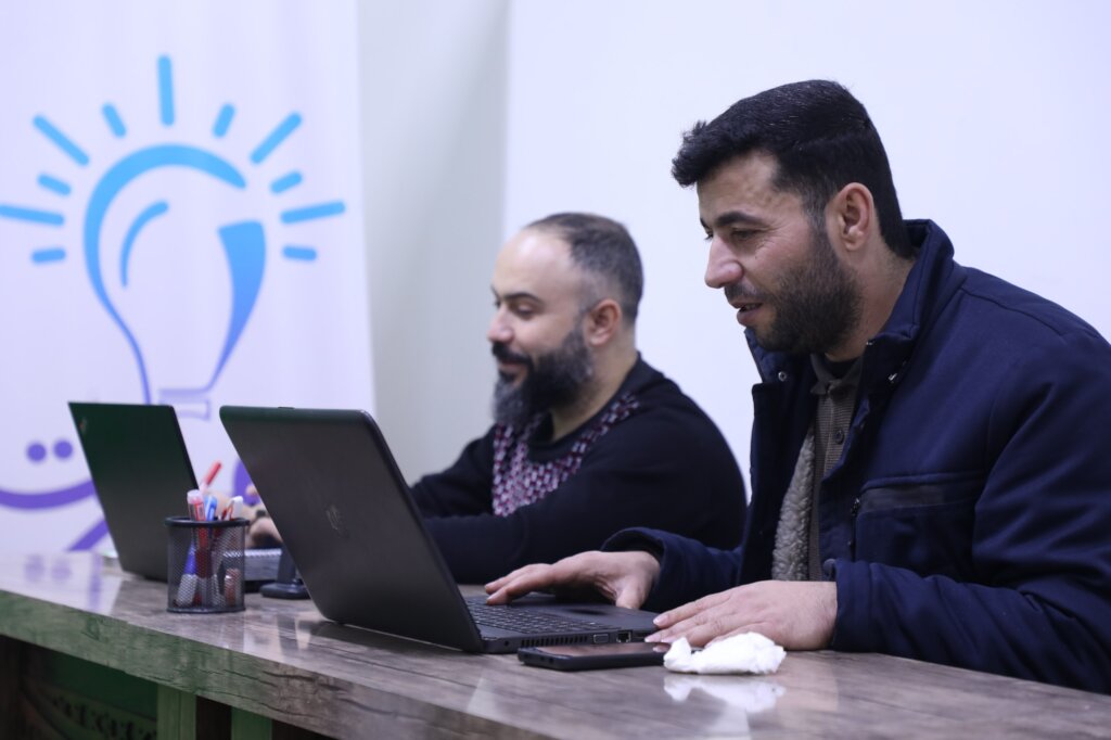 Masarat's Teachers discussing the role of peace education on community peace.